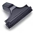 Nozzle Including Brush