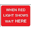 When Red Light Shows Wait Here Sign