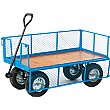 Platform Truck With Mesh Sides and Plywood Base